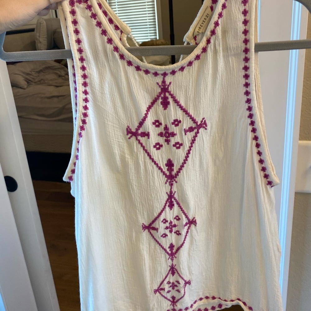 Tank with ties in back